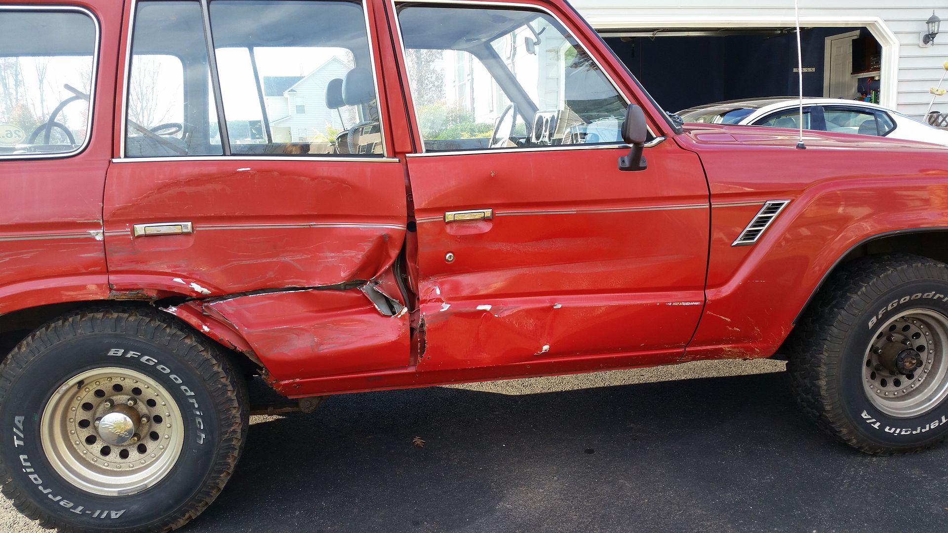 Front door bent backwards....**ck!!! IH8MUD Forum